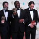 Producer Dede Gardner, producer Jeremy Kleiner, director Steve McQueen, producer Anthony Katagas and actor Brad Pitt with their awards for best film for 12 Years a Slave at the British Academy Film Awards, on Feb. 16, 2014
CARL COURT/AFP/Getty Images